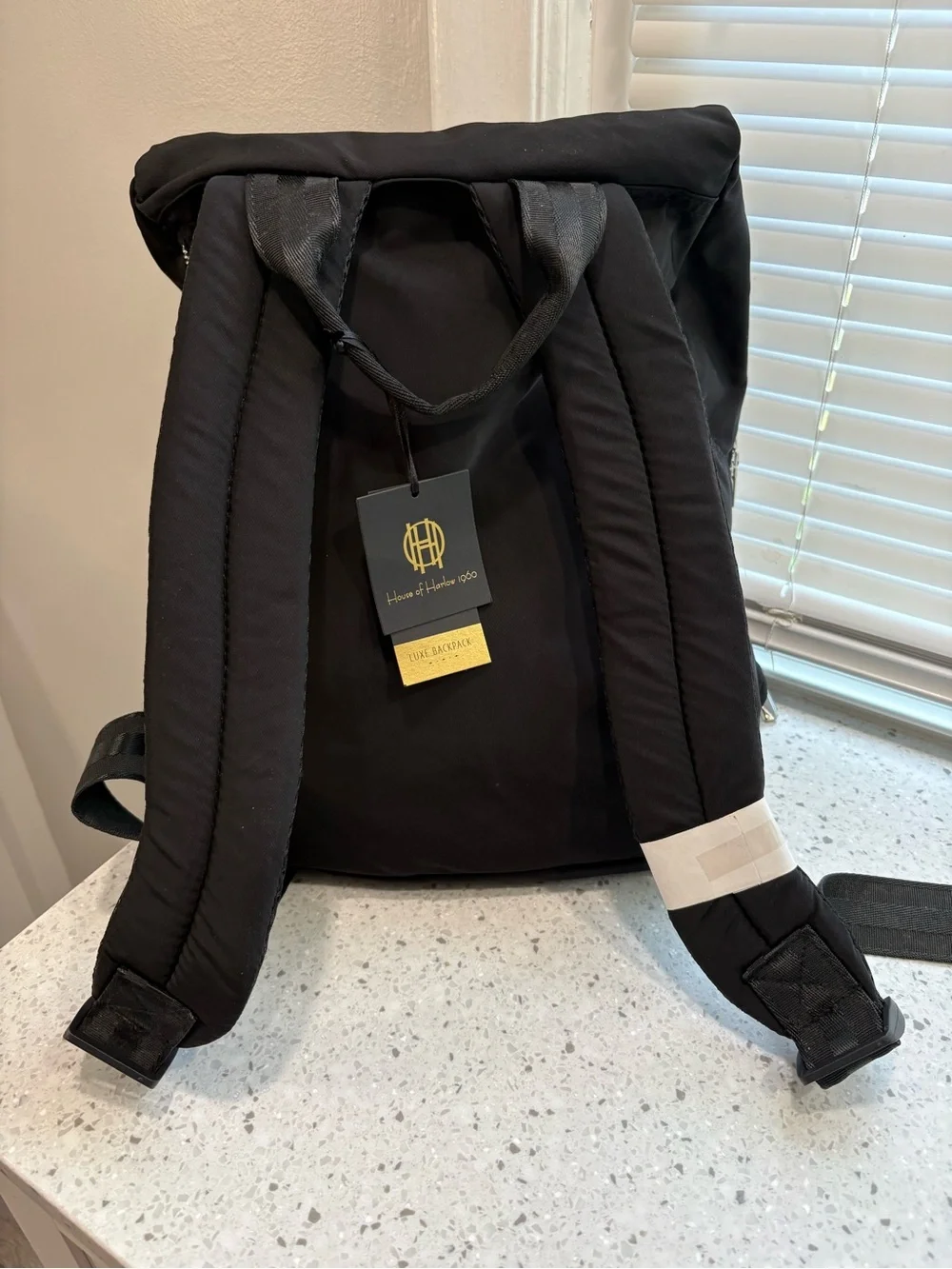 NWT House of Harlow 1960 backpack in a classic black w/ silver-tone hardware